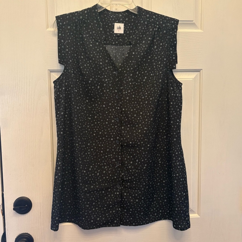 Cabi size L Navy Starry night almost sleeveless top. A+ pre-owned condition.